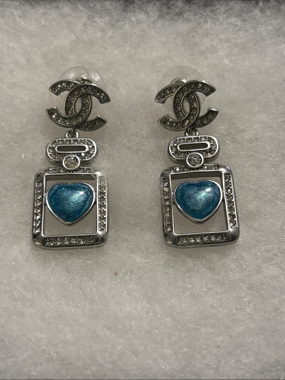 CC Silver Drop Earrings with Blue Heart Accent